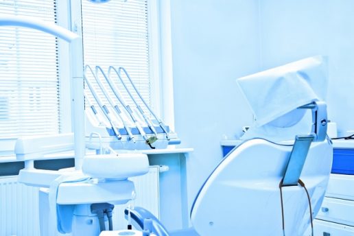 Professional Dentist tools in the dental office. Dental Hygiene and Health conceptual image. Blue image.