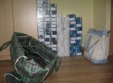 Šilutėje sulaikytas kontrabandines cigaretes nešęs taksistas