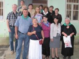Suramio bibliotekoje šilutiškiai kartu su Suramio municipaliteto meru Zaza Kurtamidze (pirmas iš kairės), bibliotekininkėmis ir vietos bendruomenės nariais